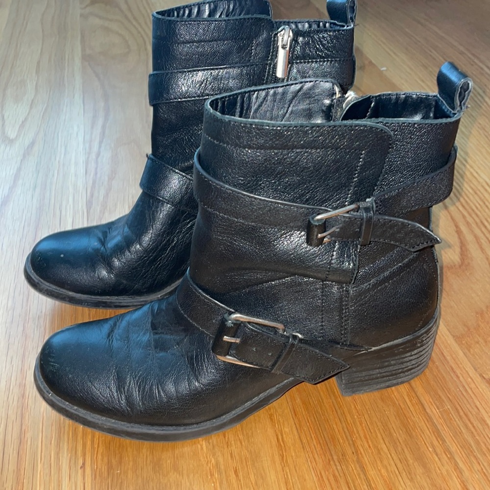 Black sole society booties with silver buckles and zipper. Size 8